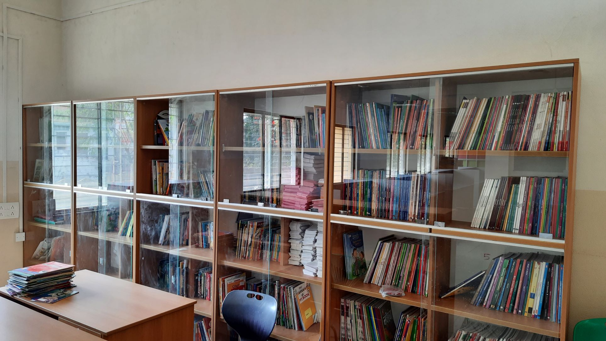 A librarian assisting a student in finding a book